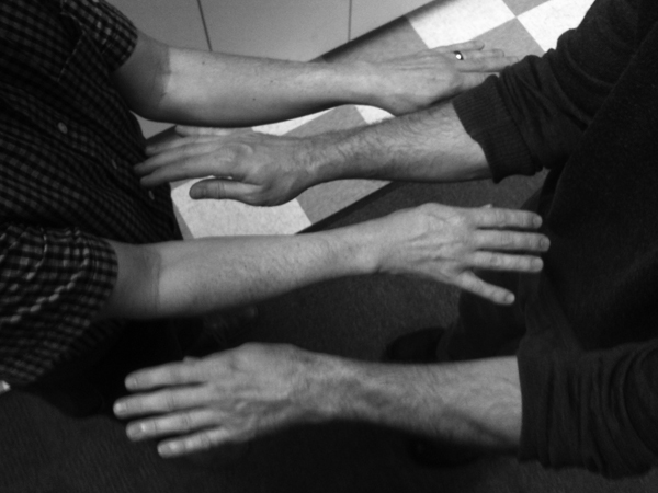 two sets of arms, one inside one outside