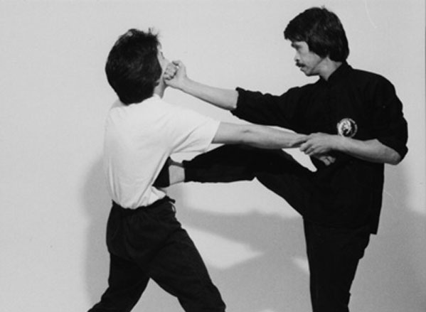 Hawkins Cheung hits an opponent